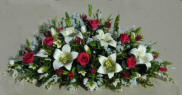 Scarlet Roses, Lilies and Ivy Mantle Display (image for) Scarlet Roses, Lilies and Ivy Mantle Display